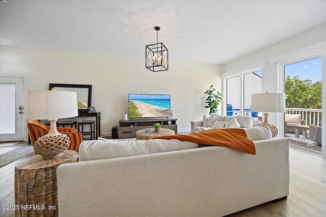 58 Tifton Way N, Ponte Vedra Beach, FL 32082 - living room with a chandelier and wood finished floors