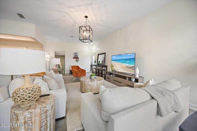 58 Tifton Way N, Ponte Vedra Beach, FL 32082 - living area featuring a chandelier and baseboards