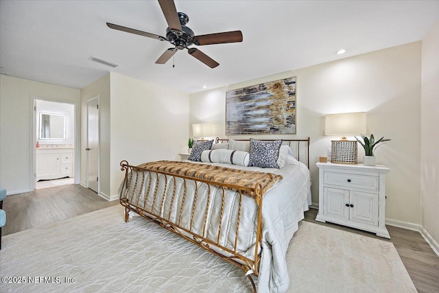 58 Tifton Way N, Ponte Vedra Beach, FL 32082 - bedroom featuring wood finished floors, recessed lighting, ceiling fan, and connected bathroom