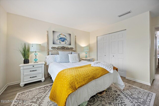 58 Tifton Way N, Ponte Vedra Beach, FL 32082 - bedroom with wood finished floors and a closet