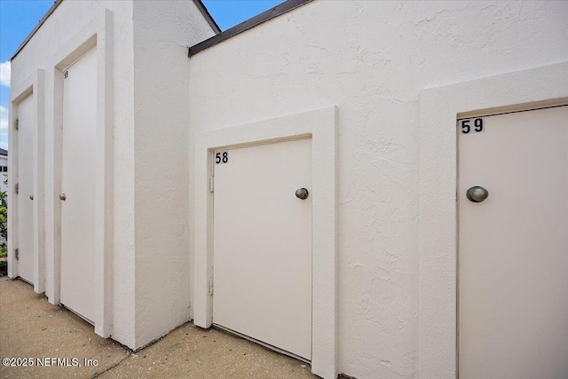 58 Tifton Way N, Ponte Vedra Beach, FL 32082 - doorway to property with stucco siding
