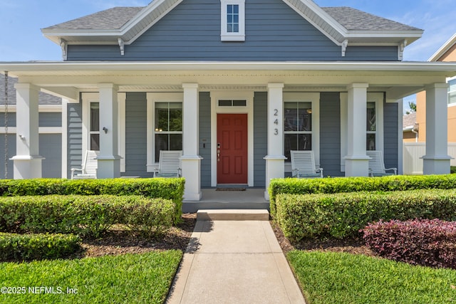 243 Olivette St, Saint Johns, FL 32259 - view of front facade with a porch and a shingled roof