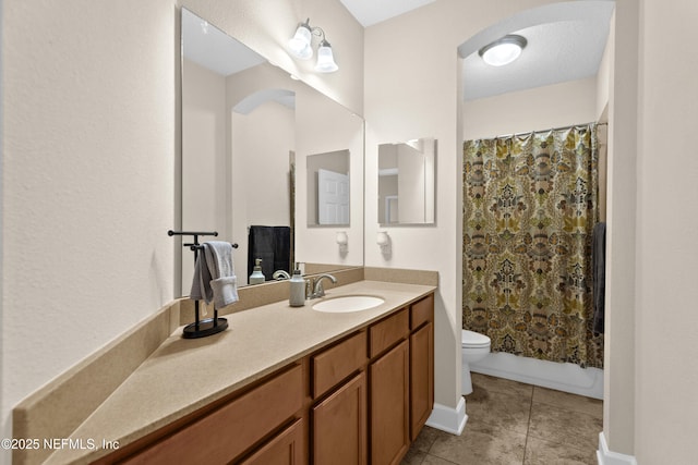 243 Olivette St, Saint Johns, FL 32259 - bathroom featuring tile patterned floors, toilet, shower / bath combo with shower curtain, and vanity