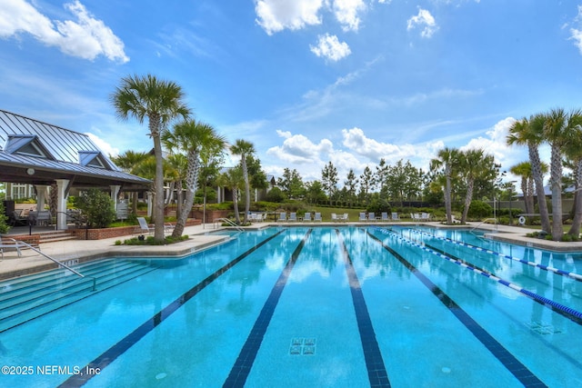 243 Olivette St, Saint Johns, FL 32259 - community pool featuring a patio area and fence