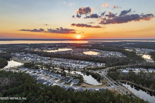 243 Olivette St, Saint Johns, FL 32259 - aerial view at dusk featuring a water view