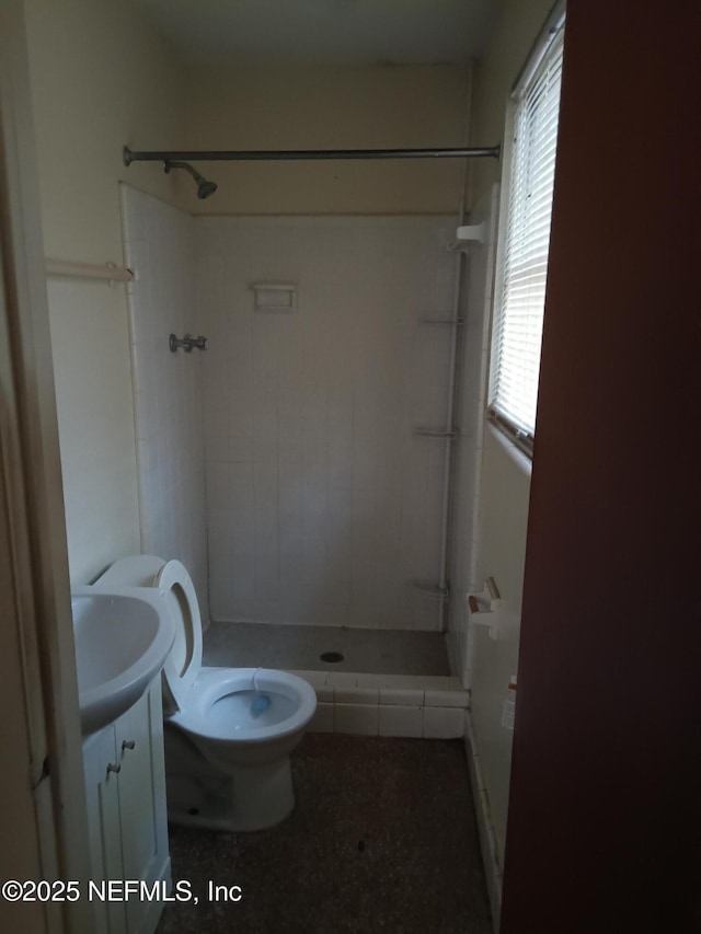 6450 San Juan Ave, Jacksonville, FL 32210 - full bathroom featuring a shower stall, vanity, and toilet