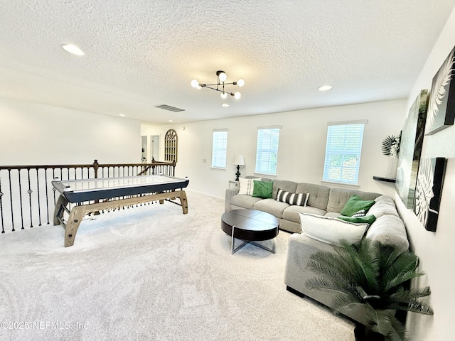 45 Princess Dr, Ponte Vedra, FL 32081 - living room with a wealth of natural light, recessed lighting, a textured ceiling, and carpet floors