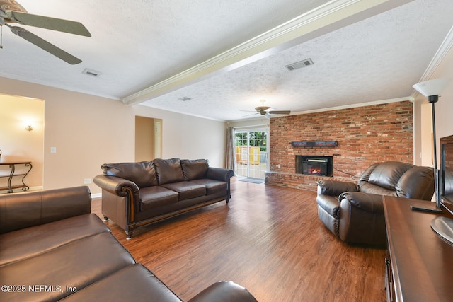 10870 High Ridge Rd, Jacksonville, FL 32225 - living area with a fireplace, wood finished floors, and ceiling fan