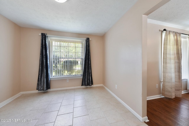 10870 High Ridge Rd, Jacksonville, FL 32225 - spare room with a textured ceiling, baseboards, and crown molding