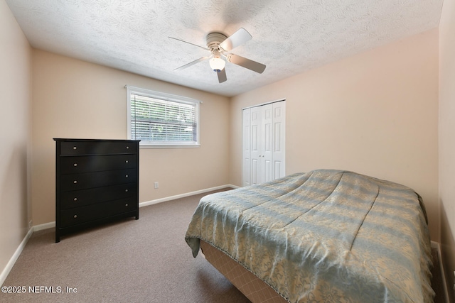 10870 High Ridge Rd, Jacksonville, FL 32225 - bedroom featuring carpet, a textured ceiling, a closet, a ceiling fan, and baseboards
