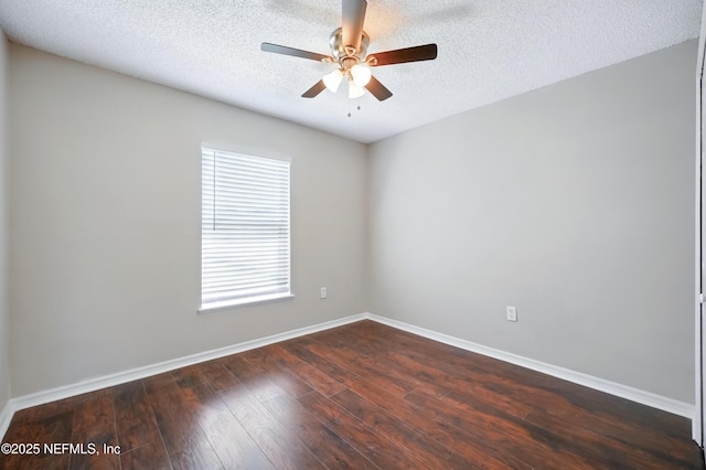 117 Sterling Hill Dr, Jacksonville, FL 32225 - empty room featuring dark wood-type flooring, a textured ceiling, baseboards, and ceiling fan