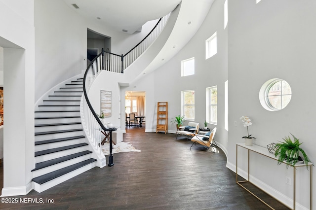 890 Beach Ave, Atlantic Beach, FL 32233 - foyer entrance featuring stairs, baseboards, and wood finished floors