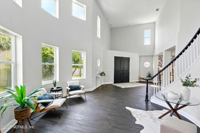 890 Beach Ave, Atlantic Beach, FL 32233 - entryway with a wealth of natural light, stairway, and wood finished floors