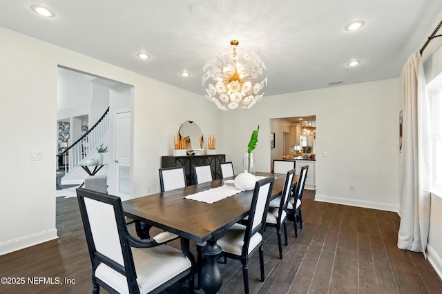 890 Beach Ave, Atlantic Beach, FL 32233 - dining room with recessed lighting, stairs, dark wood-type flooring, and a notable chandelier