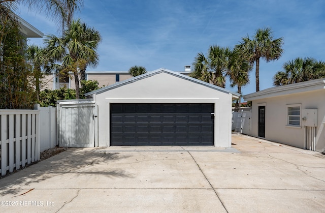890 Beach Ave, Atlantic Beach, FL 32233 - detached garage with fence and a gate