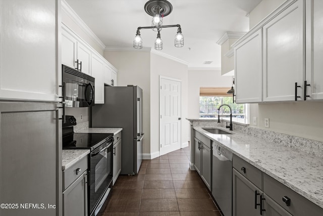 10961 Burnt Mill Rd Unit 622, Jacksonville, FL 32256 - kitchen with a sink, black appliances, crown molding, and light stone countertops
