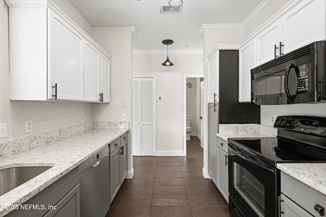 10961 Burnt Mill Rd Unit 622, Jacksonville, FL 32256 - kitchen featuring ornamental molding, light stone counters, white cabinetry, visible vents, and black appliances