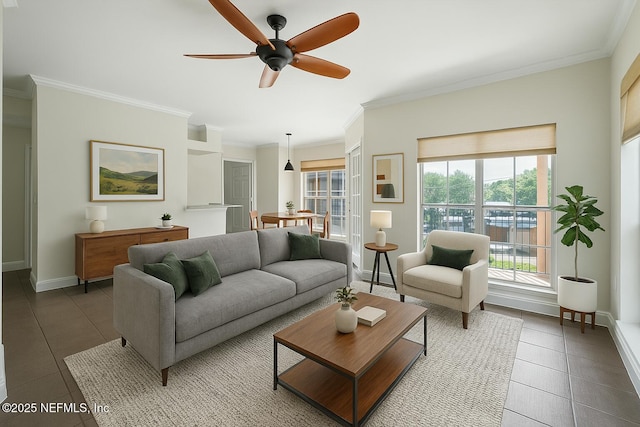 10961 Burnt Mill Rd Unit 622, Jacksonville, FL 32256 - tiled living room featuring crown molding, ceiling fan, and baseboards