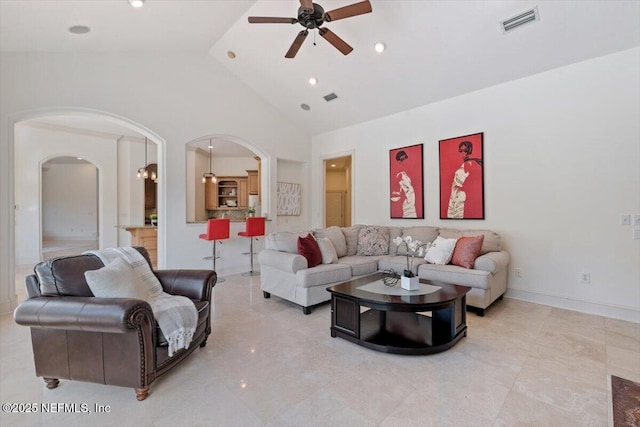 13648 Marsh Harbor Dr N, Jacksonville, FL 32225 - living room featuring high vaulted ceiling, arched walkways, visible vents, and ceiling fan