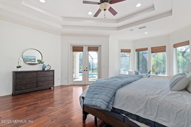 13648 Marsh Harbor Dr N, Jacksonville, FL 32225 - bedroom featuring french doors, visible vents, access to exterior, a raised ceiling, and wood finished floors