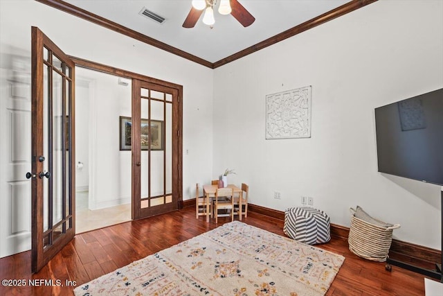 13648 Marsh Harbor Dr N, Jacksonville, FL 32225 - living area with visible vents, ornamental molding, ceiling fan, hardwood / wood-style flooring, and french doors