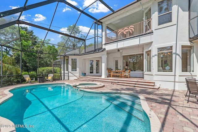 13648 Marsh Harbor Dr N, Jacksonville, FL 32225 - view of pool featuring french doors, a patio area, a pool with connected hot tub, and glass enclosure