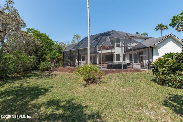 13648 Marsh Harbor Dr N, Jacksonville, FL 32225 - rear view of property featuring a yard, glass enclosure, and stucco siding
