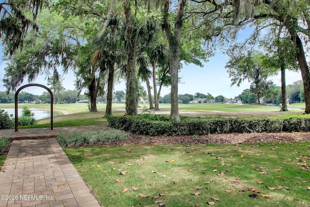 13648 Marsh Harbor Dr N, Jacksonville, FL 32225 - view of community featuring a yard, view of golf course, and a water view