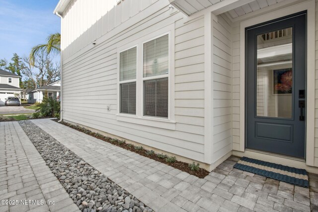 157 Oak Pk Dr, Saint Johns, FL 32259 - view of home's exterior with board and batten siding