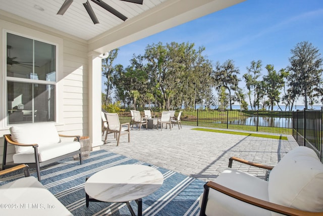 157 Oak Pk Dr, Saint Johns, FL 32259 - view of patio / terrace with a ceiling fan, a water view, a fenced backyard, and an outdoor living space