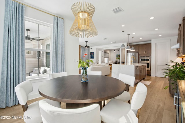 157 Oak Pk Dr, Saint Johns, FL 32259 - dining area with ceiling fan, light wood-style floors, and recessed lighting