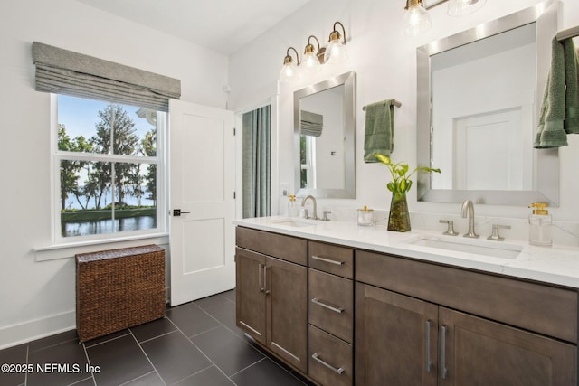 157 Oak Pk Dr, Saint Johns, FL 32259 - bathroom with double vanity and tile patterned flooring