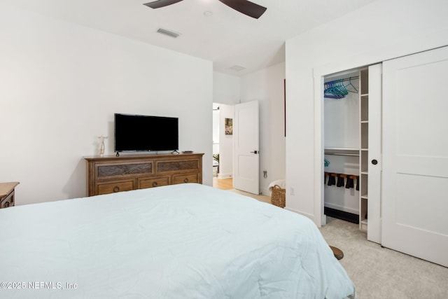 157 Oak Pk Dr, Saint Johns, FL 32259 - bedroom featuring light colored carpet, ceiling fan, and a closet