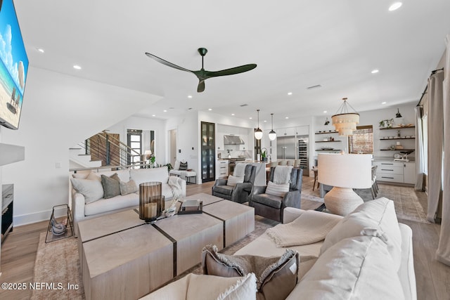 3516 1st St S, Jacksonville Beach, FL 32250 - living room featuring light wood-type flooring, a ceiling fan, and recessed lighting