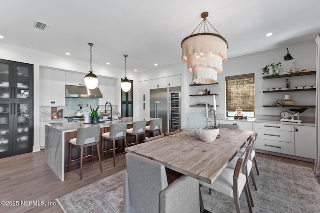 3516 1st St S, Jacksonville Beach, FL 32250 - dining space featuring light wood-style flooring, visible vents, and recessed lighting
