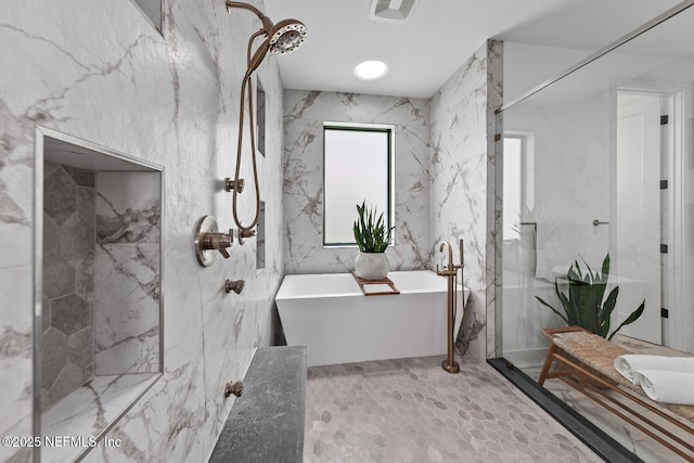 3516 1st St S, Jacksonville Beach, FL 32250 - bathroom featuring a marble finish shower and a freestanding tub