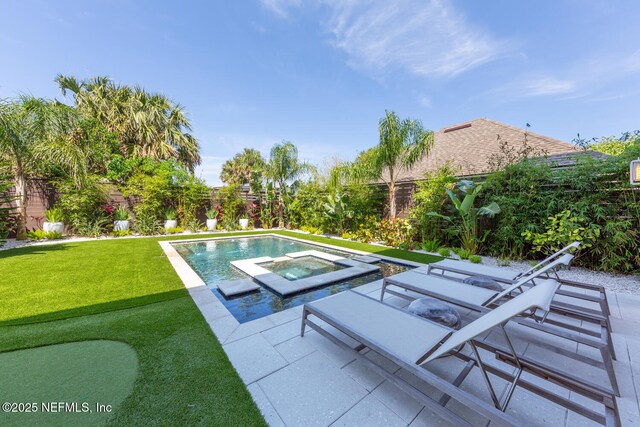 3516 1st St S, Jacksonville Beach, FL 32250 - view of pool with a yard, a patio area, an in ground hot tub, and a fenced backyard