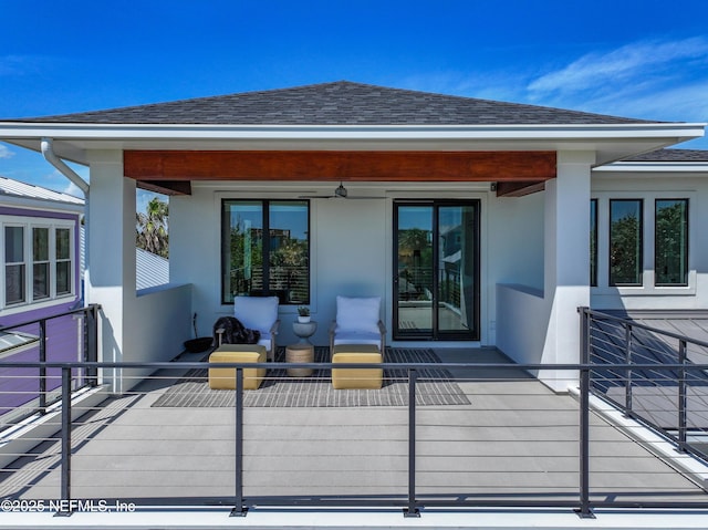 3516 1st St S, Jacksonville Beach, FL 32250 - rear view of property featuring a shingled roof and stucco siding
