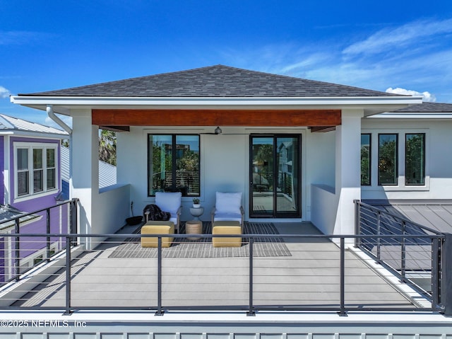 3516 1st St S, Jacksonville Beach, FL 32250 - back of property with stucco siding and a shingled roof