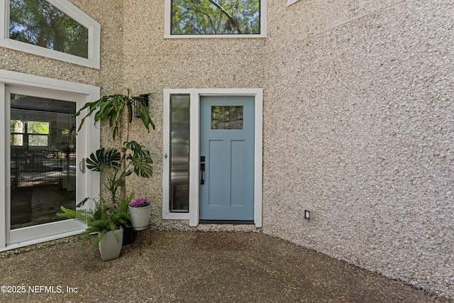 97282 Yorkshire Dr, Yulee, FL 32097 - doorway to property with stucco siding
