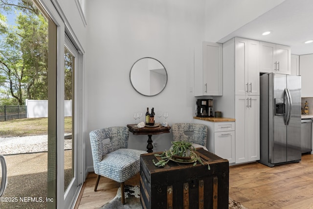 97282 Yorkshire Dr, Yulee, FL 32097 - kitchen with appliances with stainless steel finishes, light wood-style flooring, white cabinetry, and recessed lighting