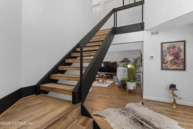 97282 Yorkshire Dr, Yulee, FL 32097 - staircase featuring wood finished floors and baseboards