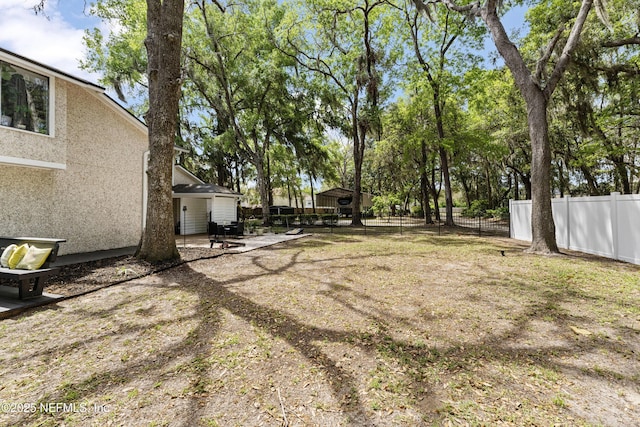 97282 Yorkshire Dr, Yulee, FL 32097 - view of yard featuring fence and a patio