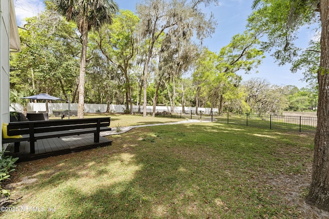 97282 Yorkshire Dr, Yulee, FL 32097 - view of yard with a deck and view of wooded area
