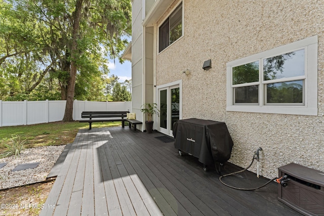 97282 Yorkshire Dr, Yulee, FL 32097 - wooden terrace featuring a fenced backyard and grilling area