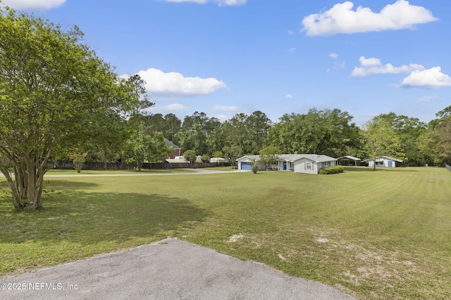 view of yard with a detached carport