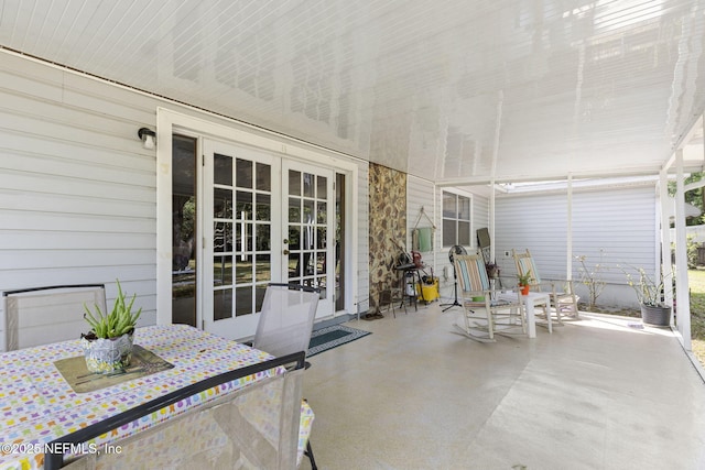 view of patio / terrace with outdoor dining area and french doors
