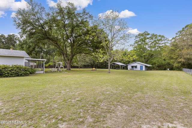 view of yard featuring a carport