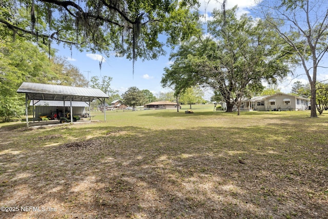view of yard with a carport