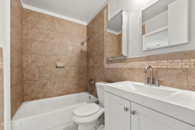 3133 W 9th St, Jacksonville, FL 32254 - bathroom featuring washtub / shower combination, vanity, tile walls, and toilet